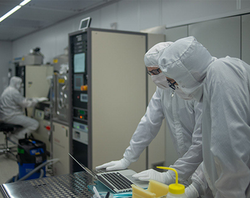 Researchers in the clean lab