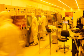 Researchers wear full-body clean suits in the WNF to prevent contamination. The air in this environment is 1,000 times cleaner than in an operating room.